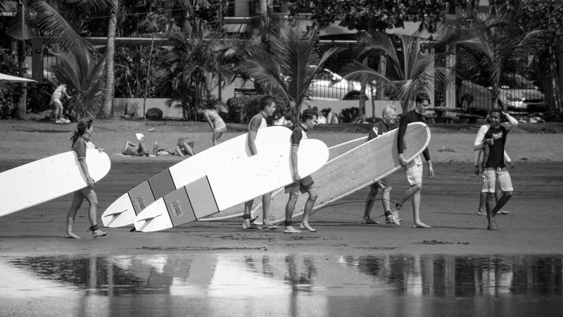 Surfing the beach break at Jaco, Costa Rica